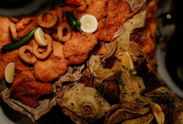 Close-up of fried schnitzels and calamari