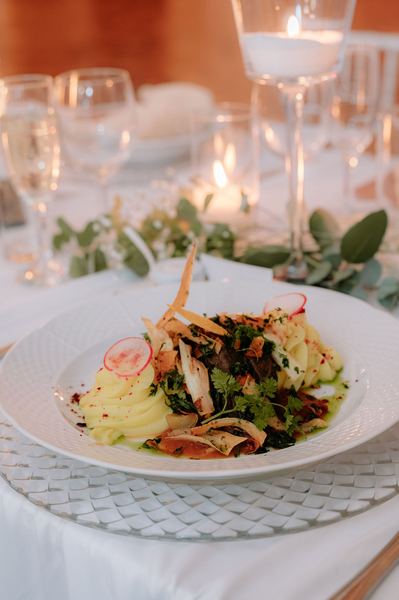 Plated wedding starter with fresh salad