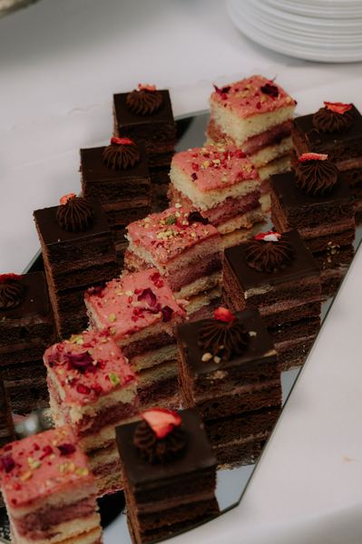 Chocolate and raspberry slices at a wedding sweet bar