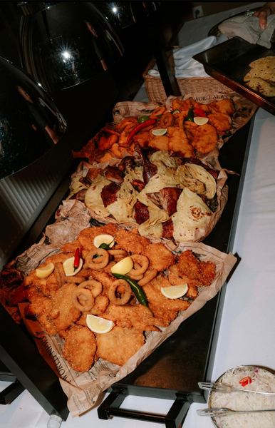 Fried schnitzels and calamari on the buffet