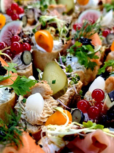 Colourful platter with fruit, cheeses and vegetables